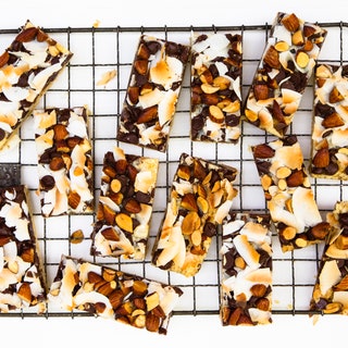 Potato chipcrusted magic bars on a wire cooling rack.
